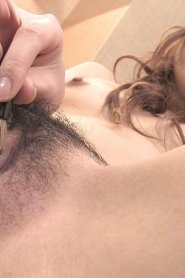 Asian Honey Rubs Her Hairy Pussy Lips With Make-Up And Fingers